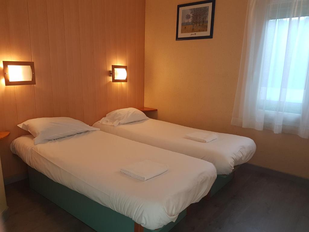 Postel nebo postele na pokoji v ubytování Fasthotel Carcassonne