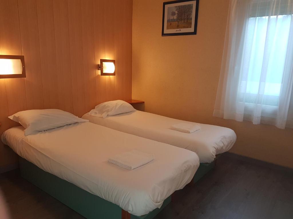 Postel nebo postele na pokoji v ubytování Fasthotel Carcassonne