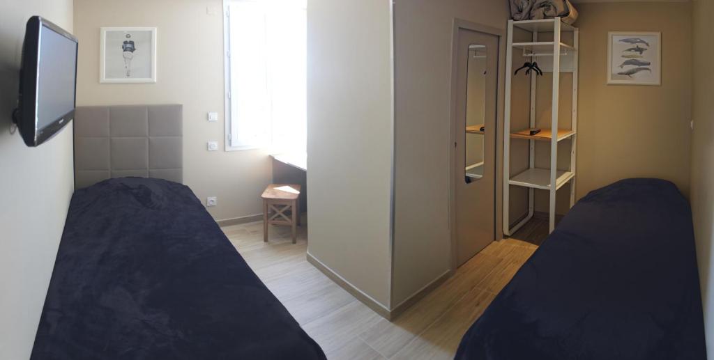 Hôtel Le Printemps - Chambre Lits Jumeaux Économique