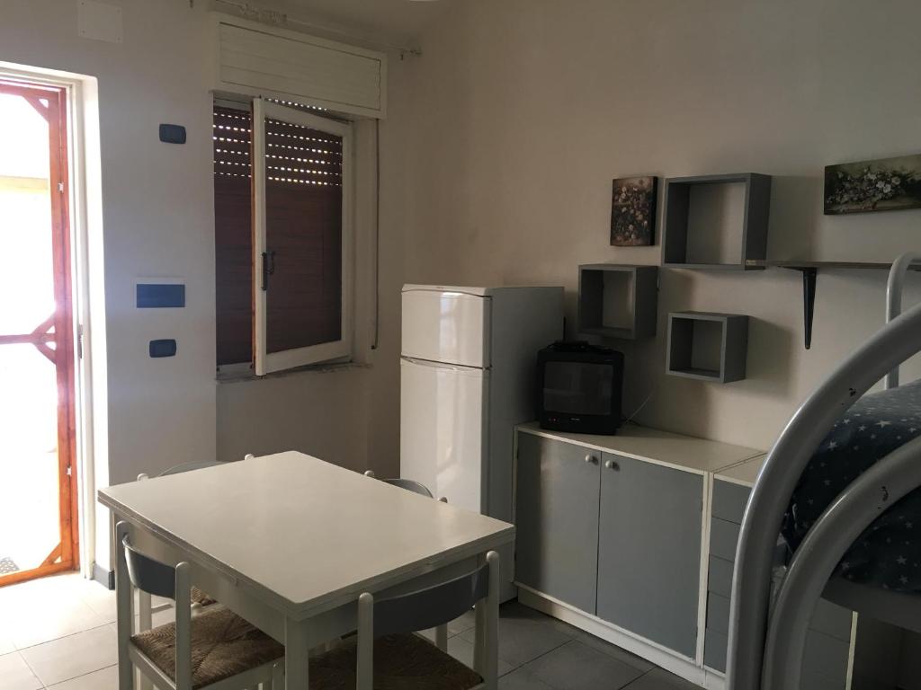 Kuchyň nebo kuchyňský kout v ubytování Residence La Quiete