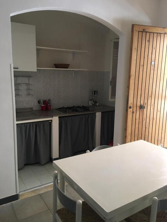 Kuchyň nebo kuchyňský kout v ubytování Residence La Quiete