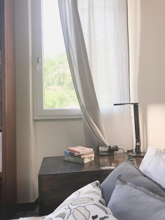 Łóżko lub łóżka w pokoju w obiekcie Casa Del Cavaliere