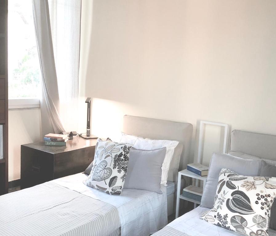 Łóżko lub łóżka w pokoju w obiekcie Casa Del Cavaliere
