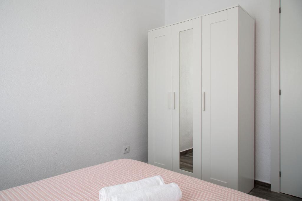 A bed or beds in a room at Home Family