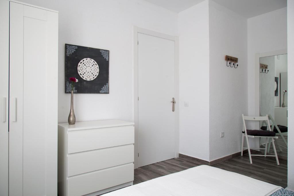 A bed or beds in a room at Home Family