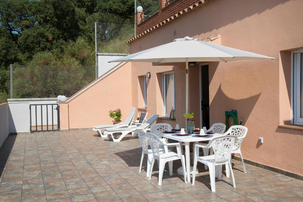 A balcony or terrace at Home Family