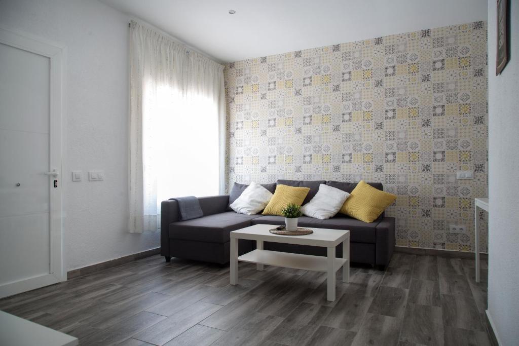 A seating area at Home Family