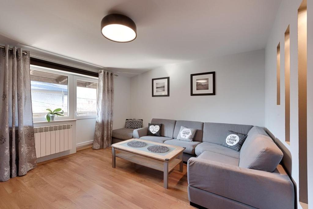 Posezení v ubytování Apartament na Myśliwskiej