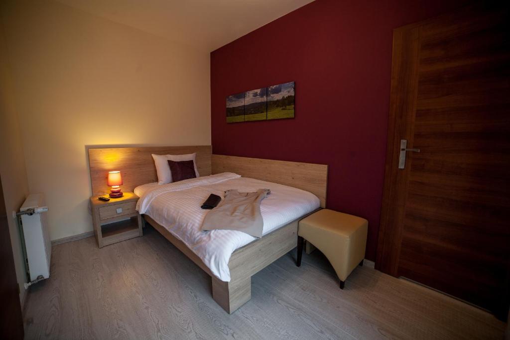 Posteľ alebo postele v izbe v ubytovaní Rezydencja Pod Ochorowiczówką B&B