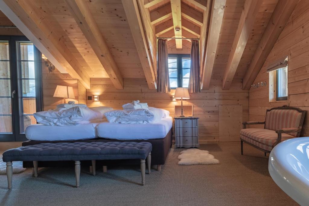 Postel nebo postele na pokoji v ubytování Rinderberg Lodge