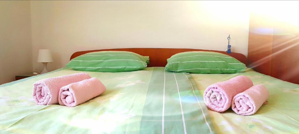 Postel nebo postele na pokoji v ubytování Pansion Margerita