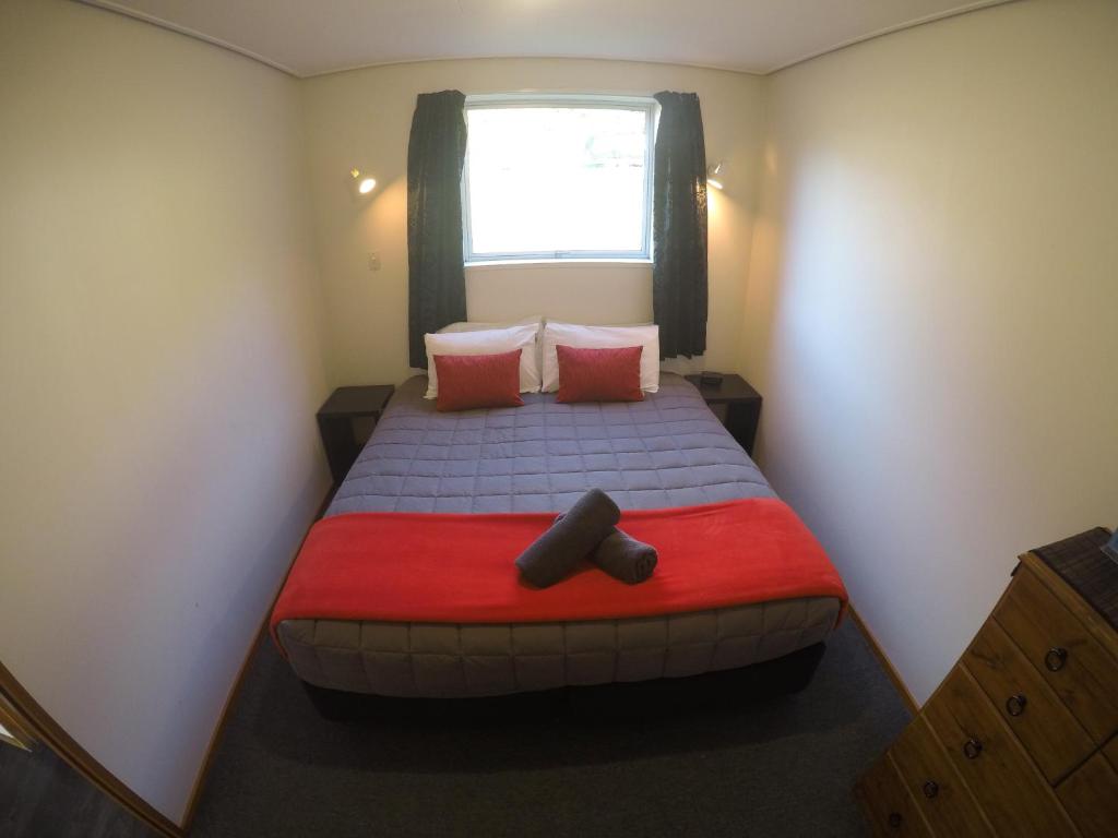 Letto o letti in una camera di Mt Aspiring Holiday Park