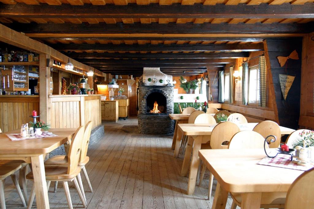 Posezení v ubytování AlmDorf Tonnerhütte