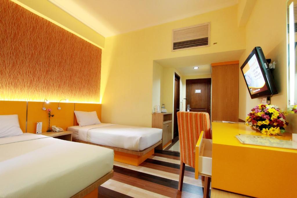 TV a/nebo společenská místnost v ubytování Pandanaran Hotel