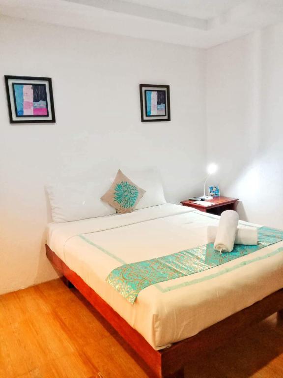 Postel nebo postele na pokoji v ubytování Discover Boracay Hotel