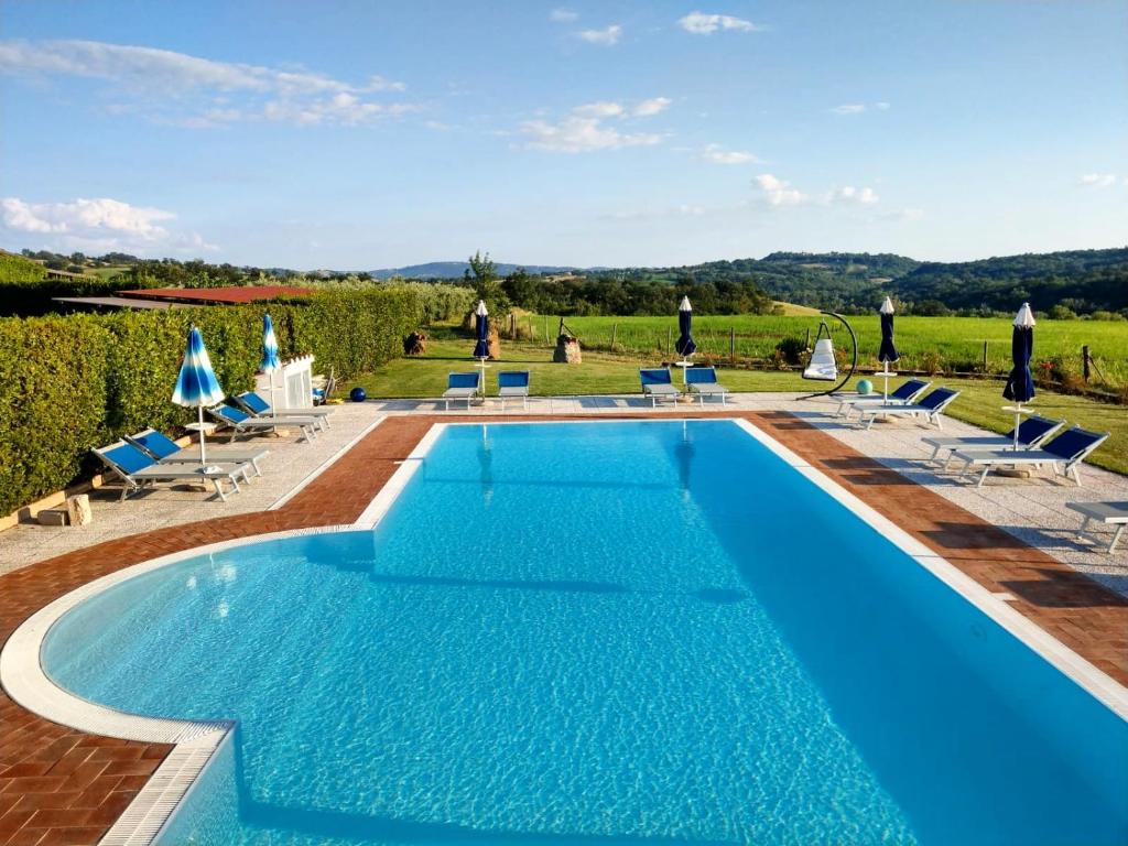 Bazén v ubytování Agriturismo Il Cavallino Saturnia nebo v jeho okolí