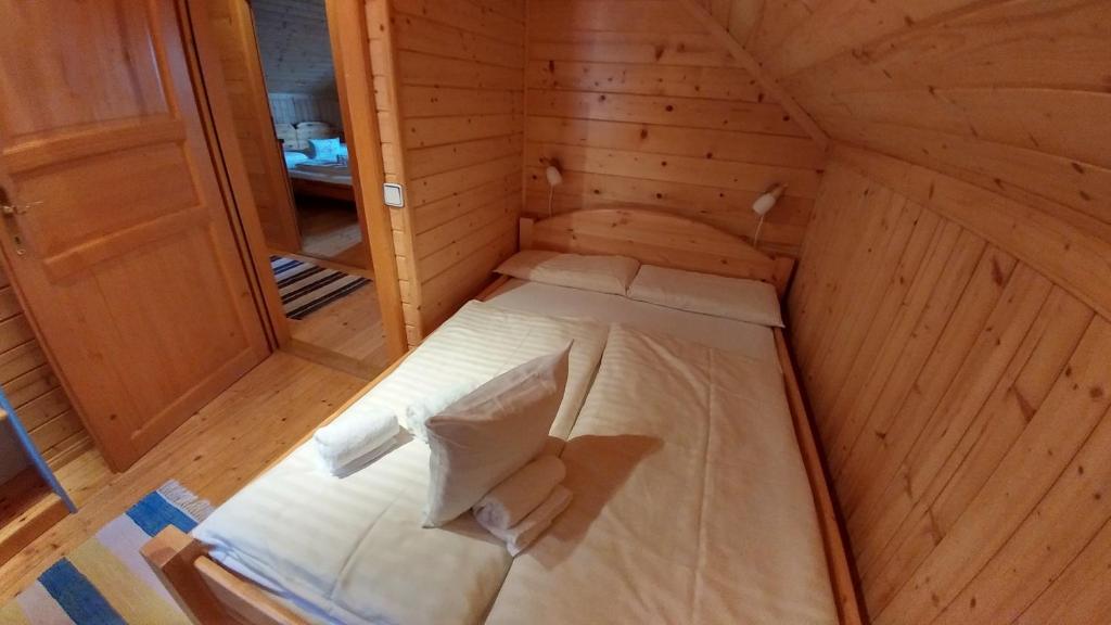 Voodi või voodid majutusasutuse Almchalet Orter toas