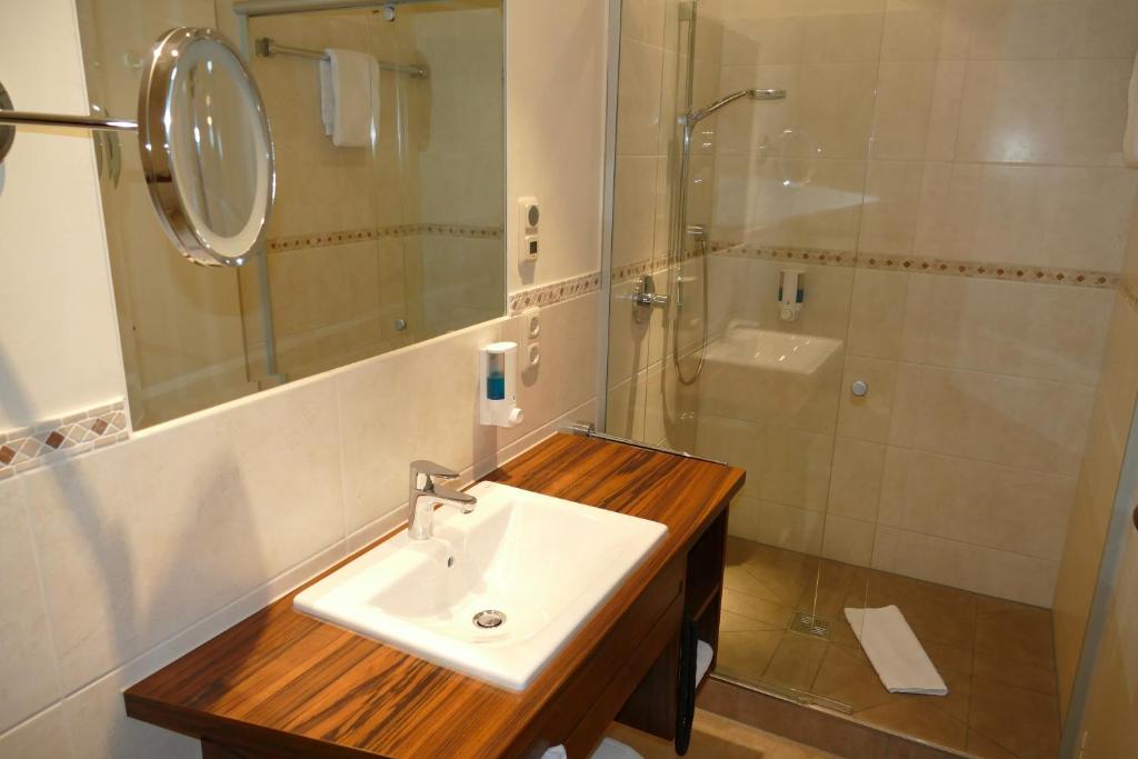 Koupelna v ubytování Hotel Heide Kröpke