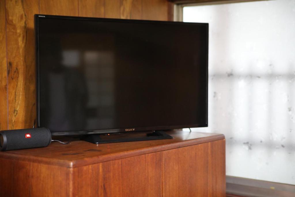 TV a/nebo společenská místnost v ubytování Guesthouse Omihachiman