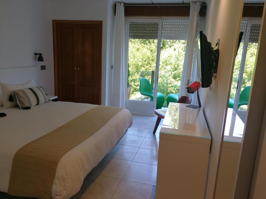 Кровать или кровати в номере Hotel Farsund