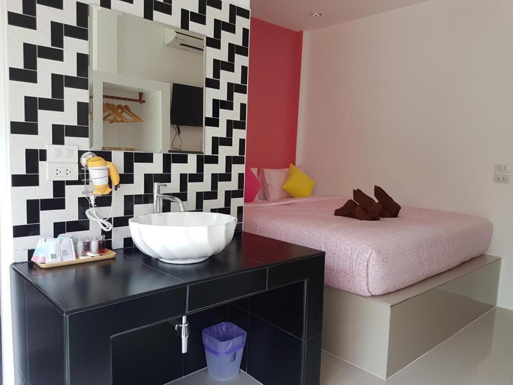 Postel nebo postele na pokoji v ubytování Phannarai House