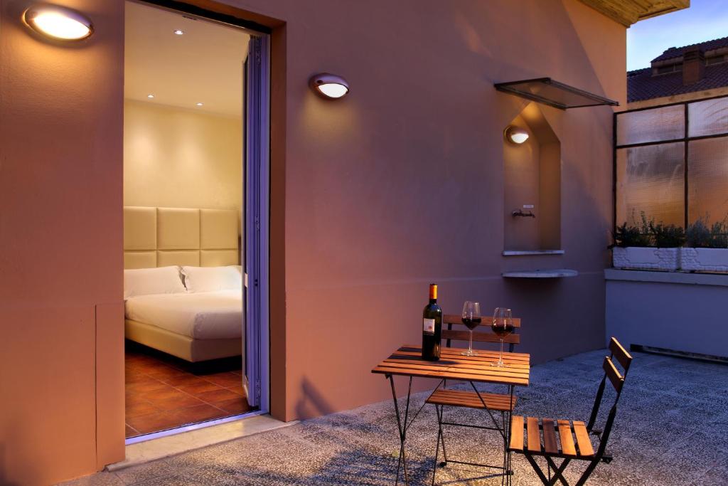 Postel nebo postele na pokoji v ubytování Hearth Hotel
