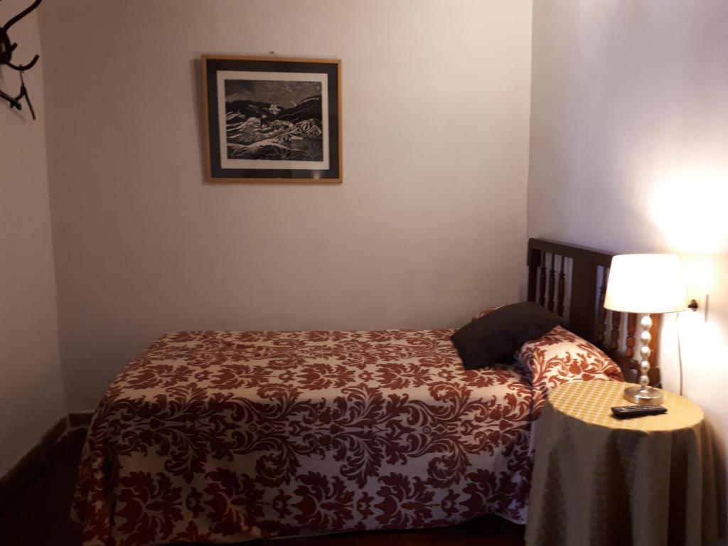 Postel nebo postele na pokoji v ubytování Fonda Del Tozal