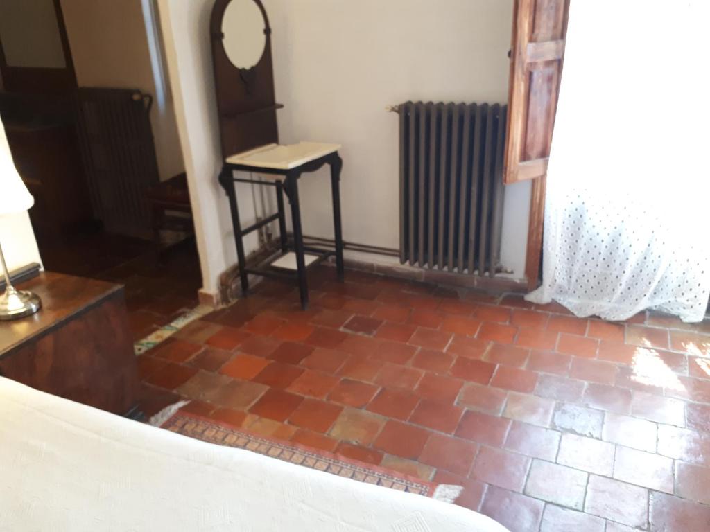 Postel nebo postele na pokoji v ubytování Fonda Del Tozal