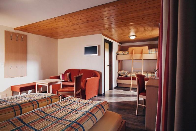 Posezení v ubytování Hotel Des Alpes