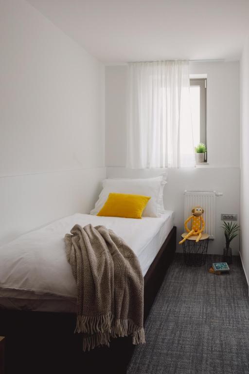 Postel nebo postele na pokoji v ubytování Residence Vaal
