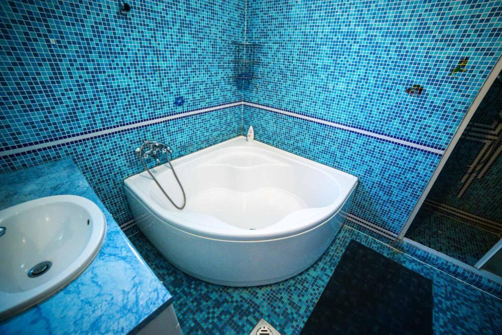 Łazienka w obiekcie Imre Apartman