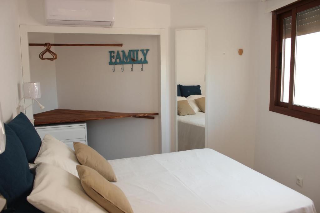 Posteľ alebo postele v izbe v ubytovaní Malaga Center Lagunillas Apartments