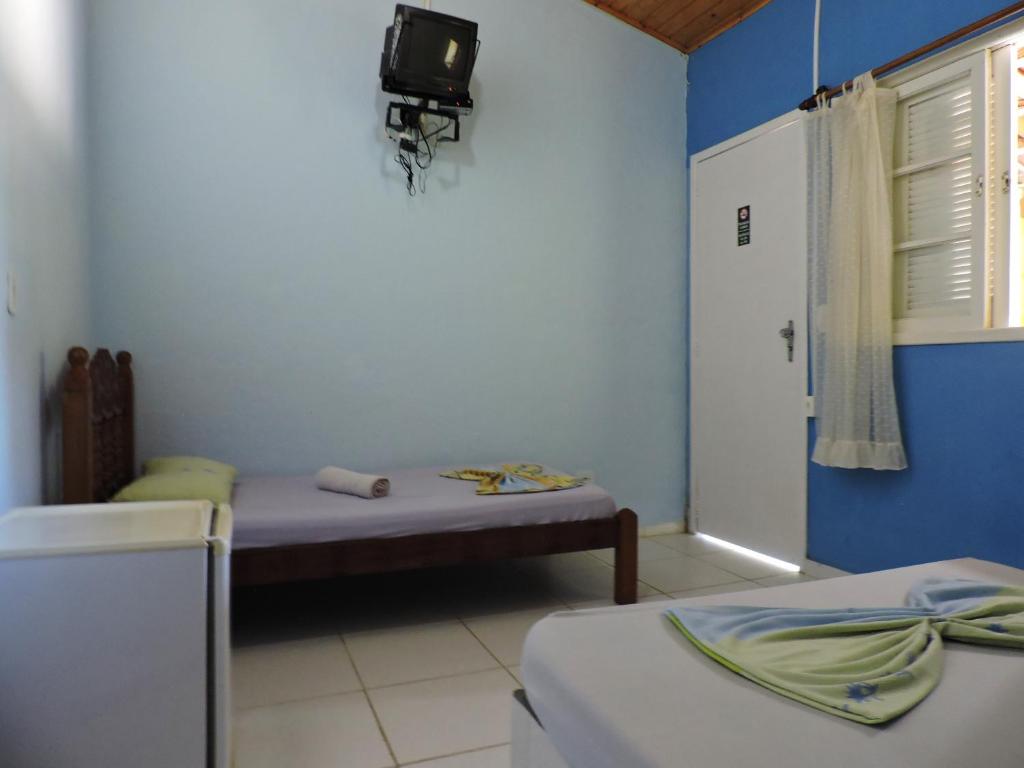Postel nebo postele na pokoji v ubytování Pousada do Horto