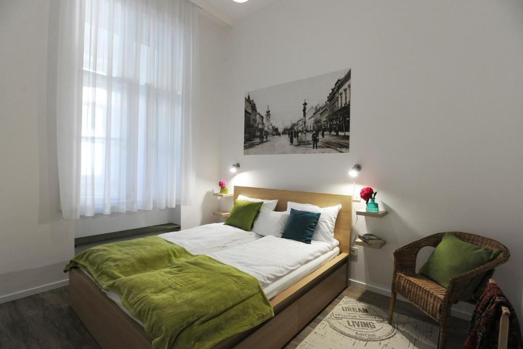 Posteľ alebo postele v izbe v ubytovaní M37 Apartman