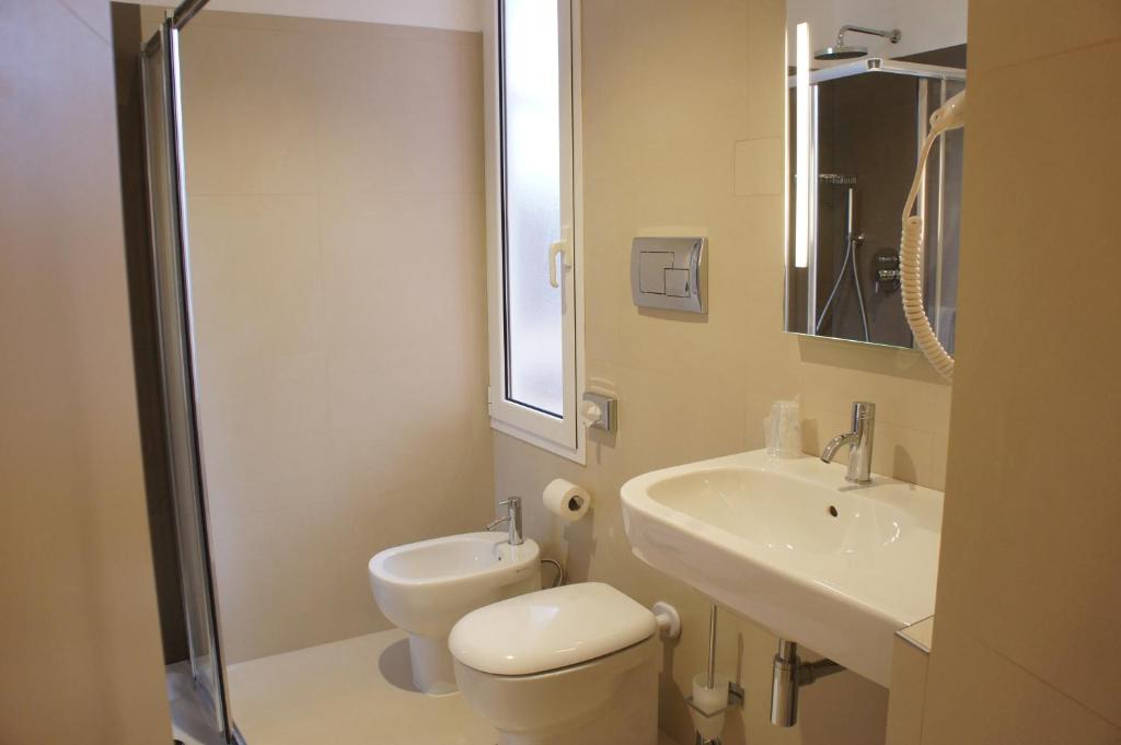 Koupelna v ubytování Hotel Aurora