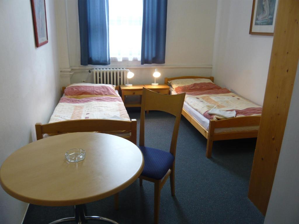 Postel nebo postele na pokoji v ubytování Hotel Hasa