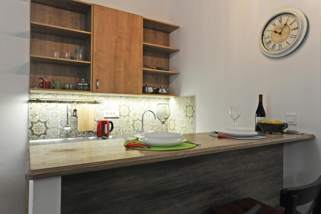Kuchyňa alebo kuchynka v ubytovaní M37 Apartman