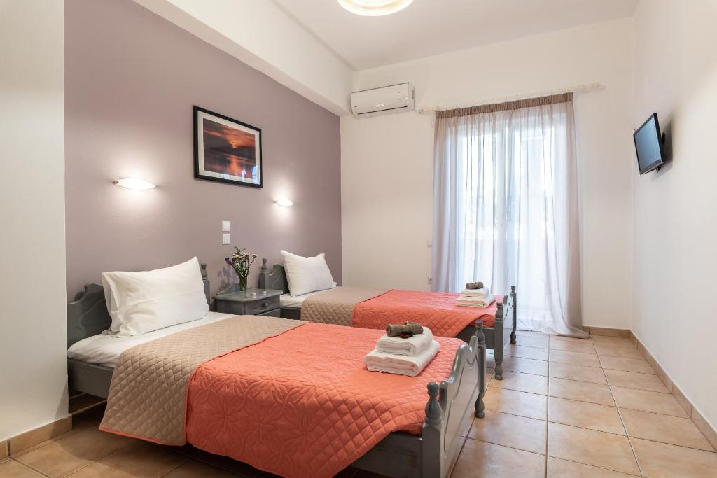 A television and/or entertainment centre at Ostria Apartments