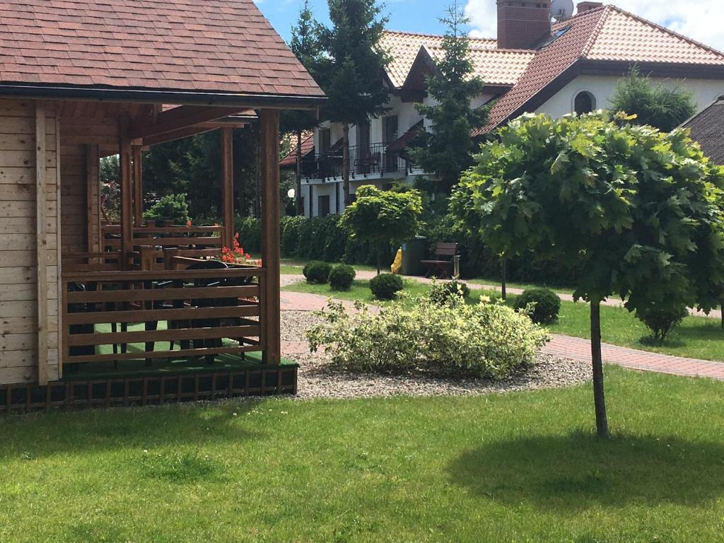 Zahrada ubytování LIDO - domy letniskowe z klimatyzacją