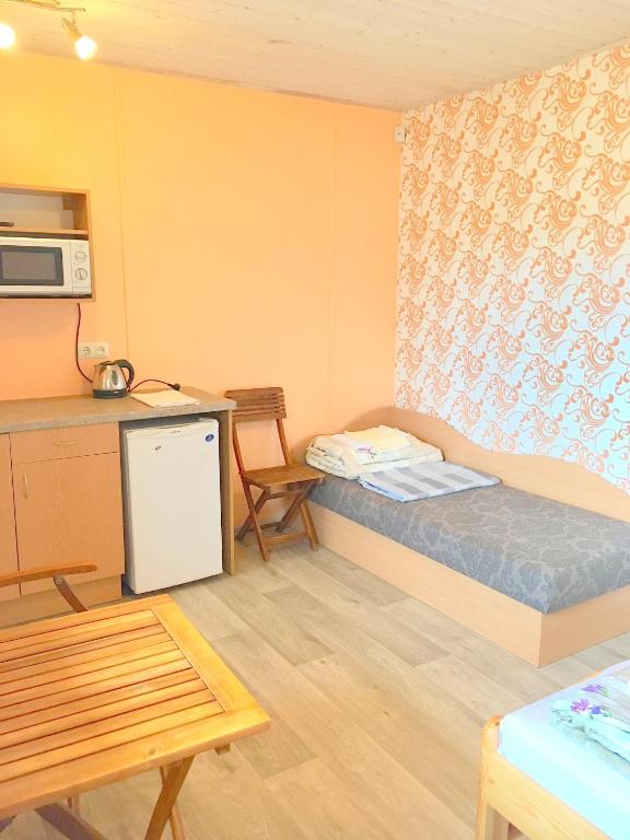 Kuchyň nebo kuchyňský kout v ubytování Poilsio namai "Undinė"