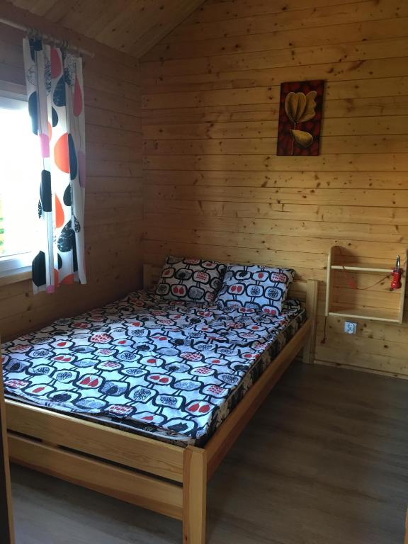 Postel nebo postele na pokoji v ubytování LIDO - domy letniskowe z klimatyzacją