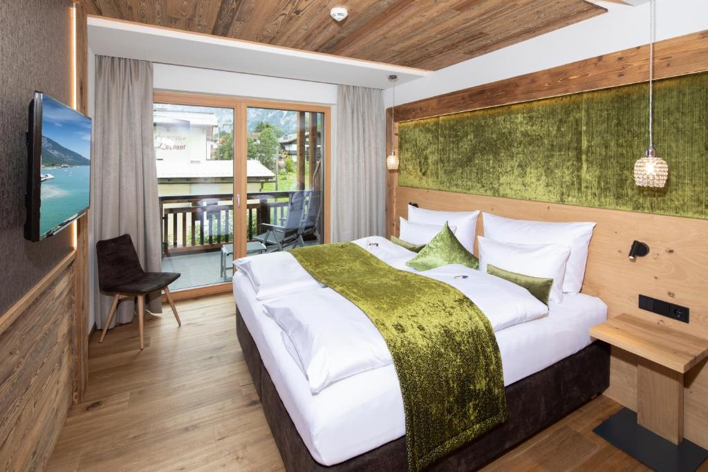 Postel nebo postele na pokoji v ubytování Wagner's Aparthotel