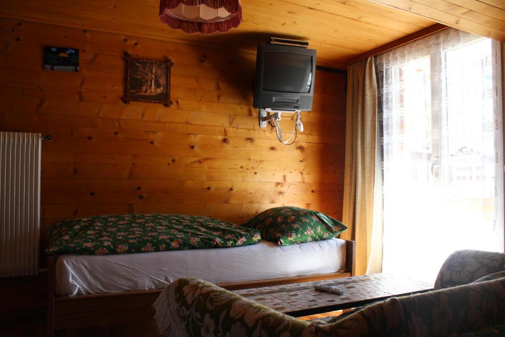 Postel nebo postele na pokoji v ubytování Haus Weideli, Dammstrasse 7