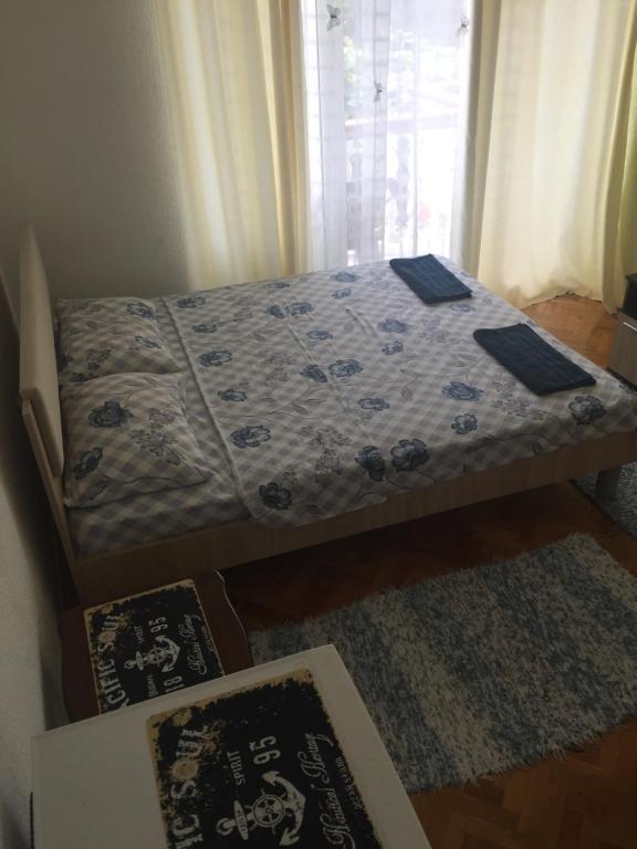Postel nebo postele na pokoji v ubytování Tina Rooms