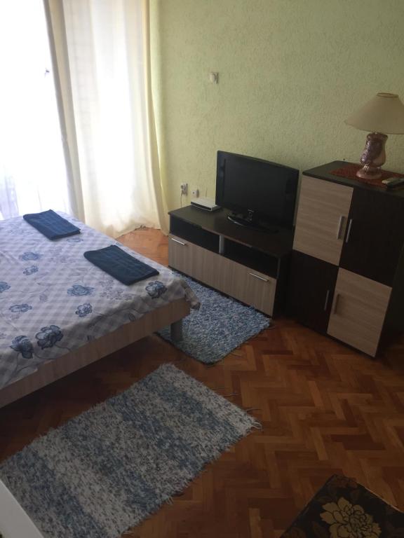 TV a/nebo společenská místnost v ubytování Tina Rooms