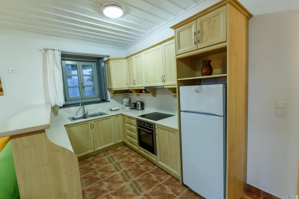 Kuchyňa alebo kuchynka v ubytovaní KK Houses