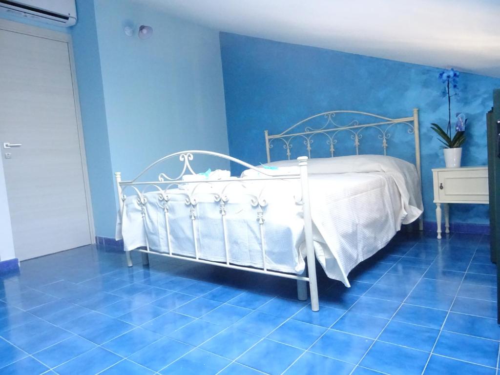 Postel nebo postele na pokoji v ubytování B&B Alòs