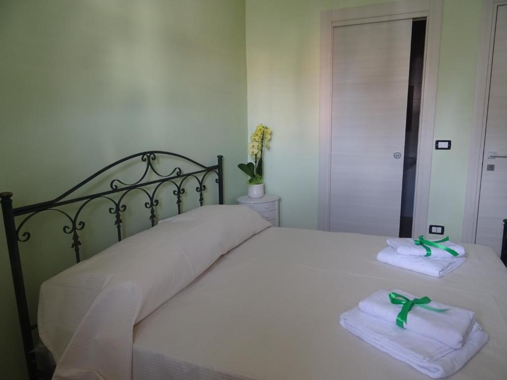 Postel nebo postele na pokoji v ubytování B&B Alòs