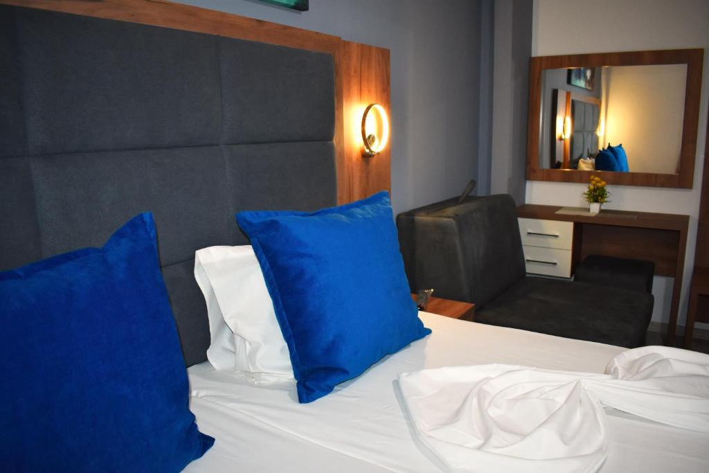 Postel nebo postele na pokoji v ubytování Apartments Fati
