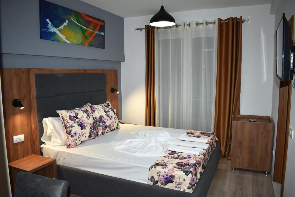 Postel nebo postele na pokoji v ubytování Apartments Fati